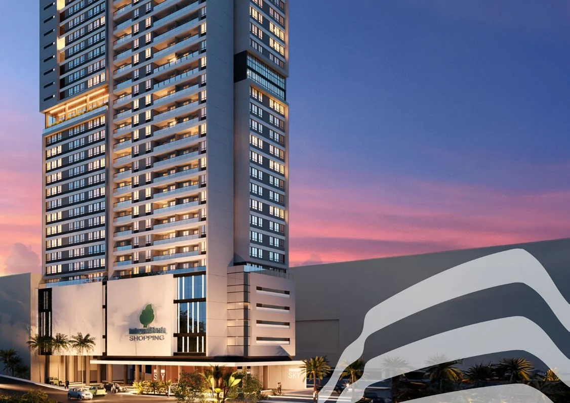 Fachada do Diamond Sky ao entardecer, com a torre residencial sobre a base junto ao Independência Shopping